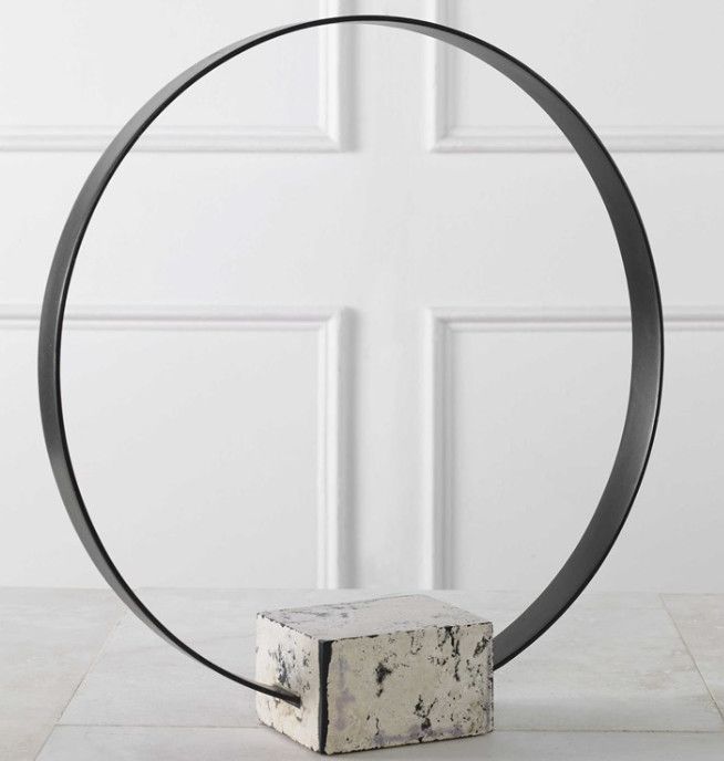 Circular Black Metal Sculpture w/ White Stone Base