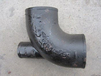 Cast Iron No Hub elbow back outlet, Size: 3"x2"
