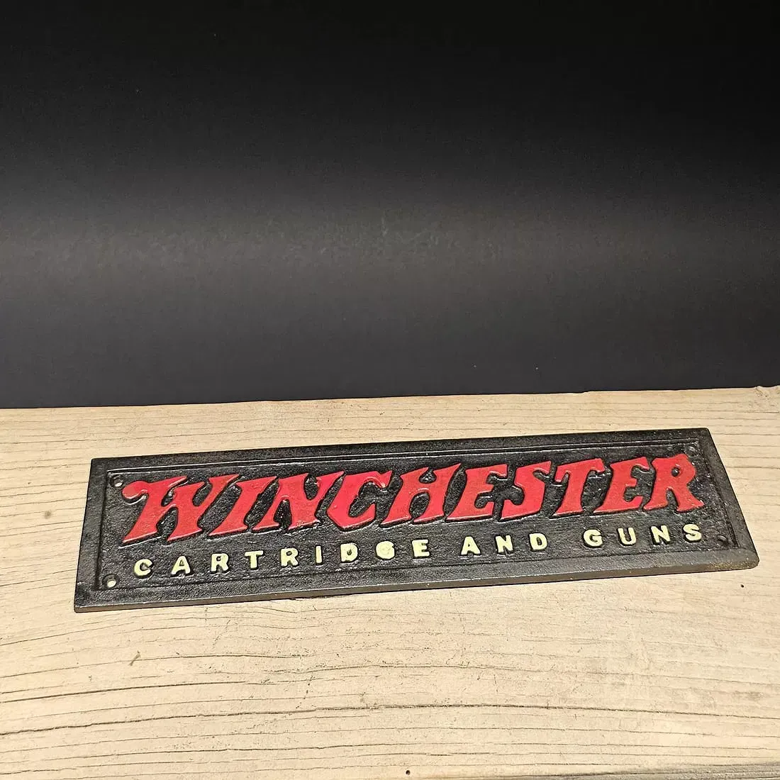 Cast Iron Winchester Sign