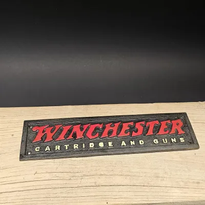 Cast Iron Winchester Sign