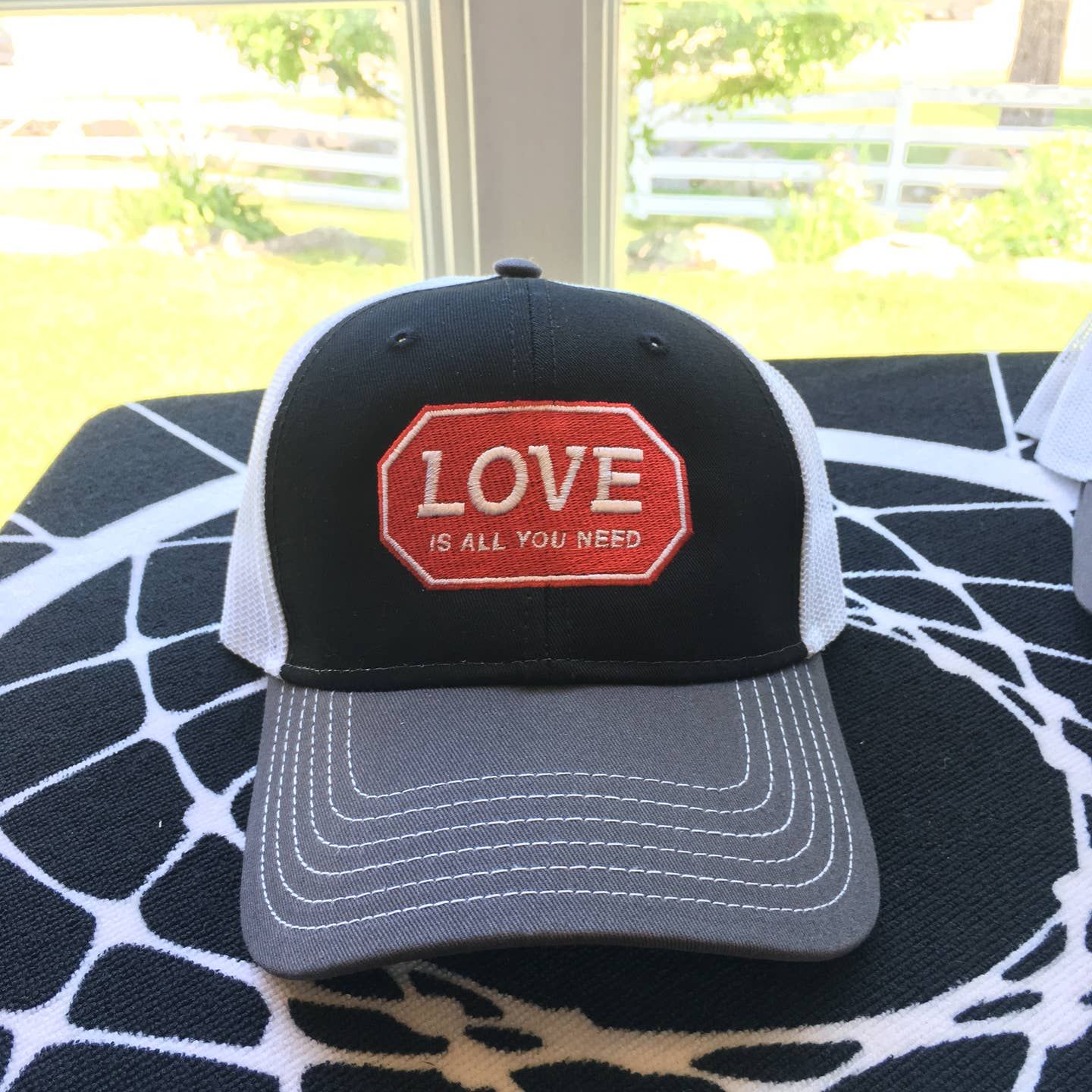 Love Is All You Need, Hat