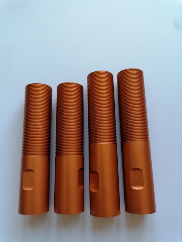 Baja shock body's orange front and rear Baja shock body's orange front and rear