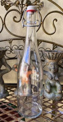 Vintage glazen limonadefles met witte porseleinen stop F SG C 75 CL​ – Productie ca. 1950–1970