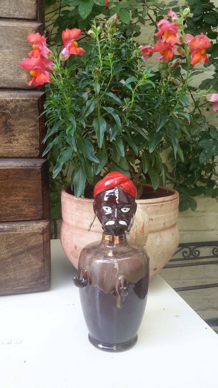 Vintage porseleinen decanter/drankfles in de vorm van een Afrikaanse man Vintage porseleinen decanter/drankfles in de vorm van een Afrikaanse man