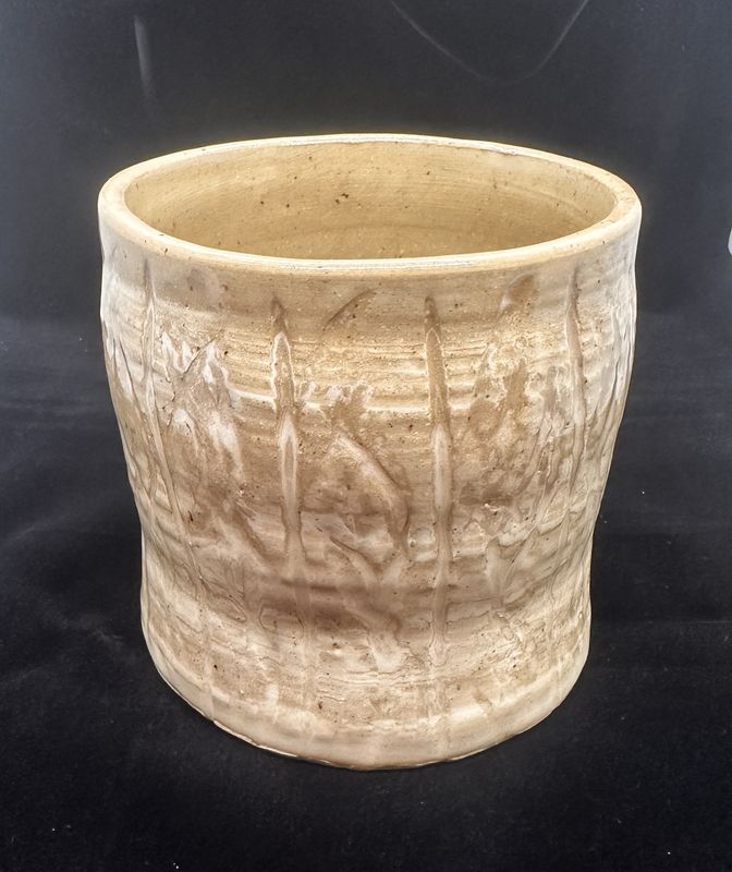 Tan incised vase