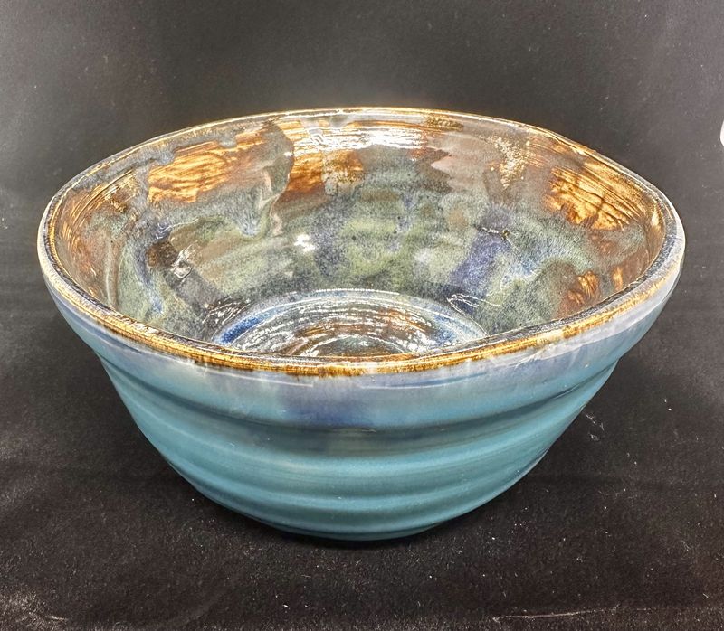 Turquoise bowl with iridescent interior