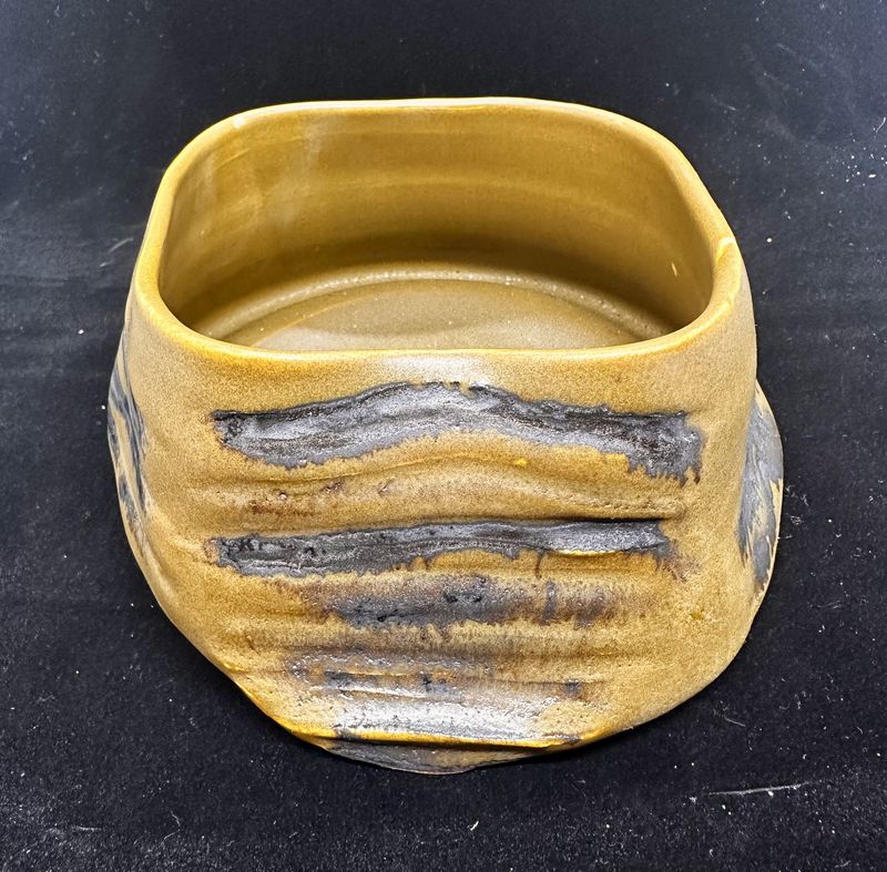 Brown incised bowl