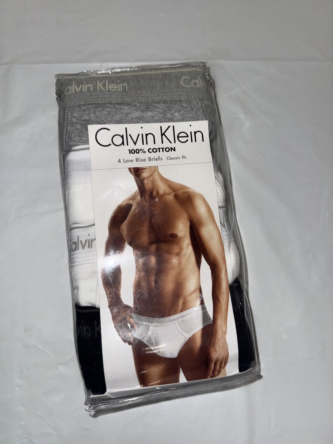 Calvin Klein low rise brifts pack 4, Colour: gray white black, Material: 100% cotton, Size: XL