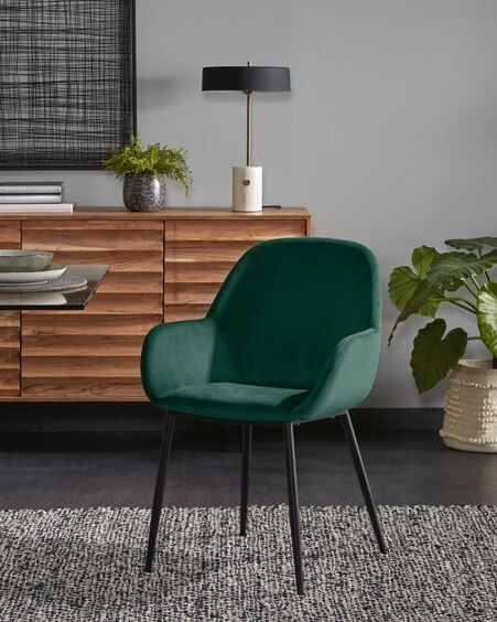 Silla Konna de terciopelo verde y patas de acero acabado pintado negro