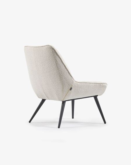 Sillón Marlina de borreguito blanco con patas de acero con acabado pintado negro