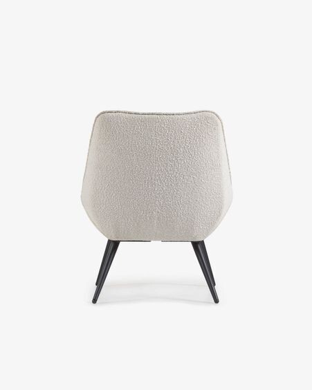 Sillón Marlina de borreguito blanco con patas de acero con acabado pintado negro