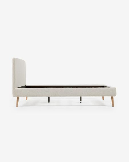 Cama Dyla de borreguito blanco y patas de madera maciza de haya 160 x 200 cm
