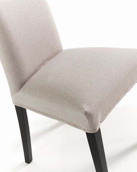 Silla Freda beige y patas de madera maciza de haya acabado negro