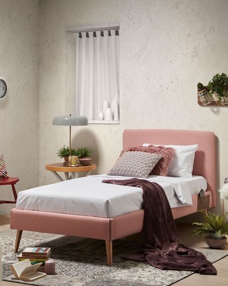 Cama desenfundable Dyla rosa con patas de madera maciza de haya 90 x 190 cm