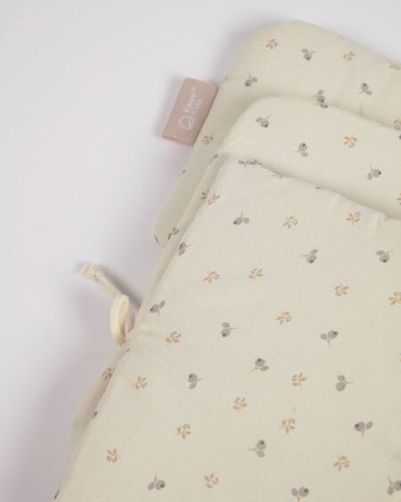Cojín trona Yamile 100% algodón orgánico (GOTS) beige con hojas multicolor