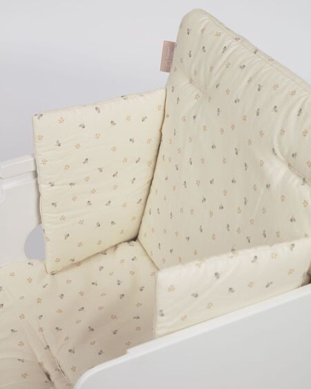 Cojín trona Yamile 100% algodón orgánico (GOTS) beige con hojas multicolor