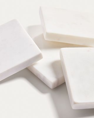 Set Coreni de 4 posavasos de mármol blanco
