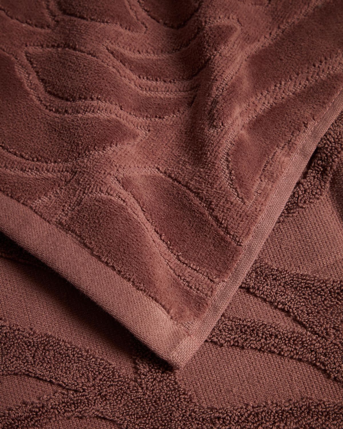 Toalla de tocador Lurevi 100% algodón jacquard con acabado terciopelo granate 30 x 50 cm
