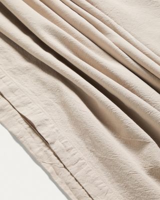Mantel Lerava de algodón con acabado lavado gris piedra 170 x 170 cm