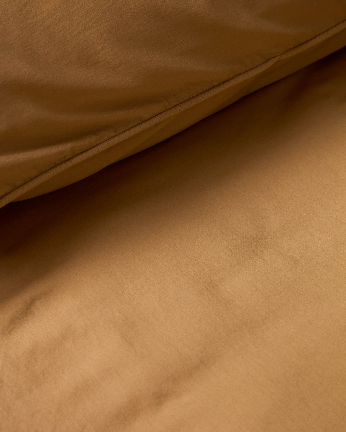Funda nórdica Sirale 100% algodón satén acabado lavado color cobre para cama de 180 cm