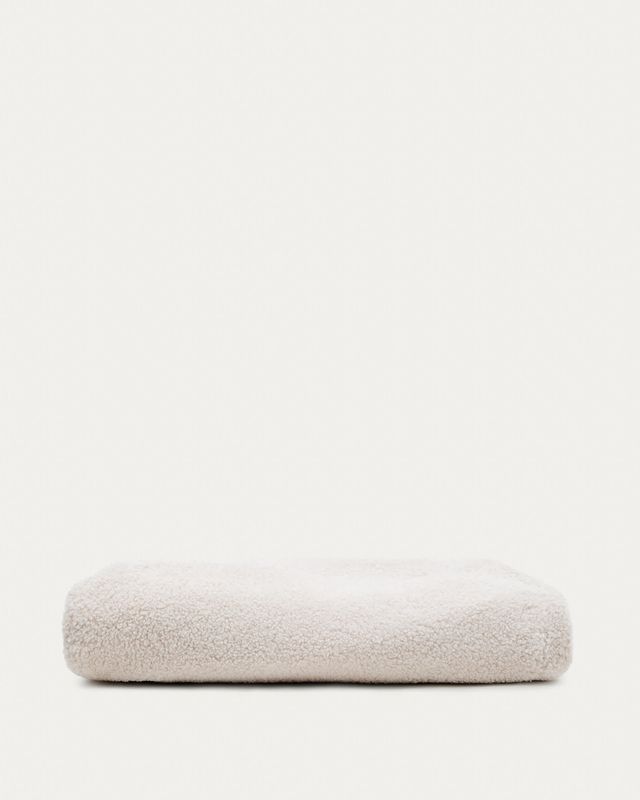 Funda para reposapiés Kaeli de borreguito crudo Ø 43 cm