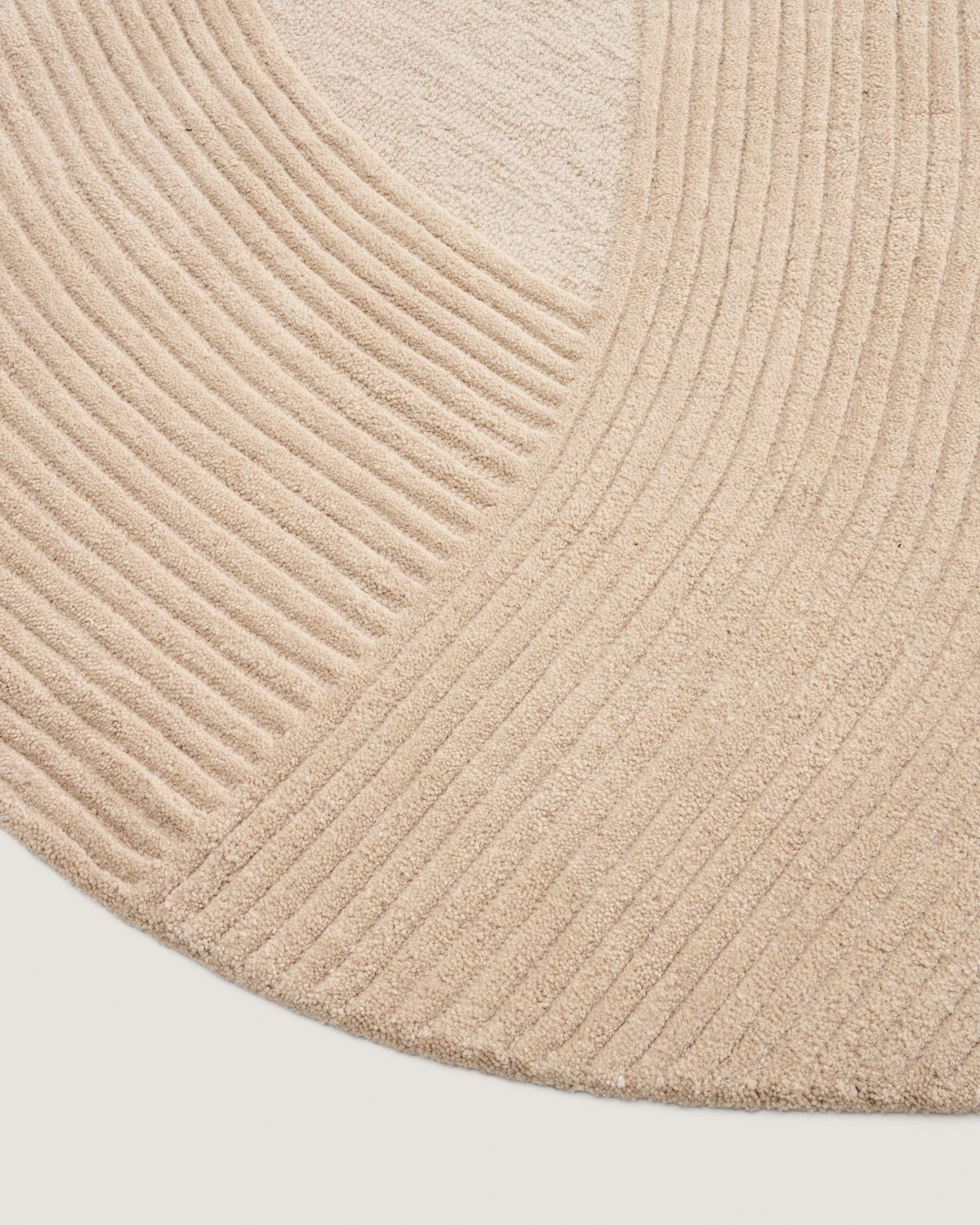 Alfombra Domm de lana beige Ø 200 cm