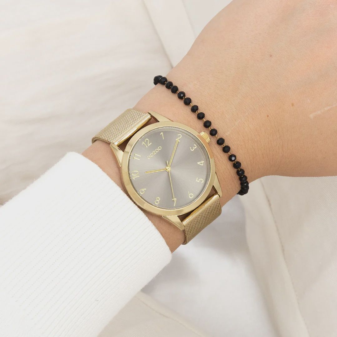 Goudkleurig horloge met goudkleurige metalen mesh armband