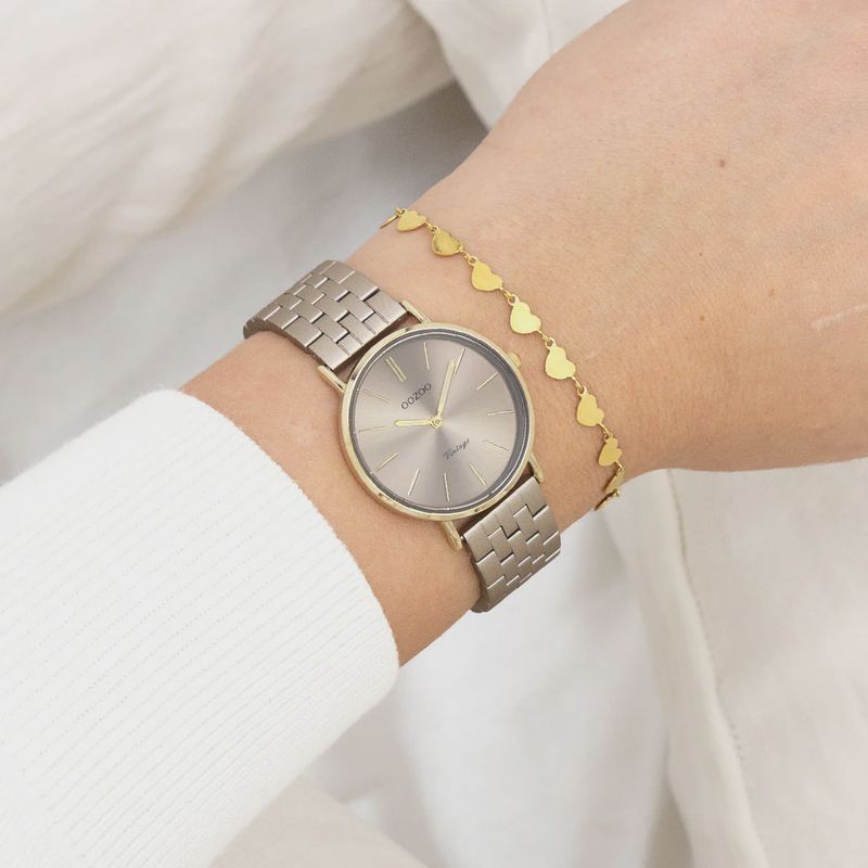 Goudkleurig horloge met taupekleurige roestvrijstalen armband