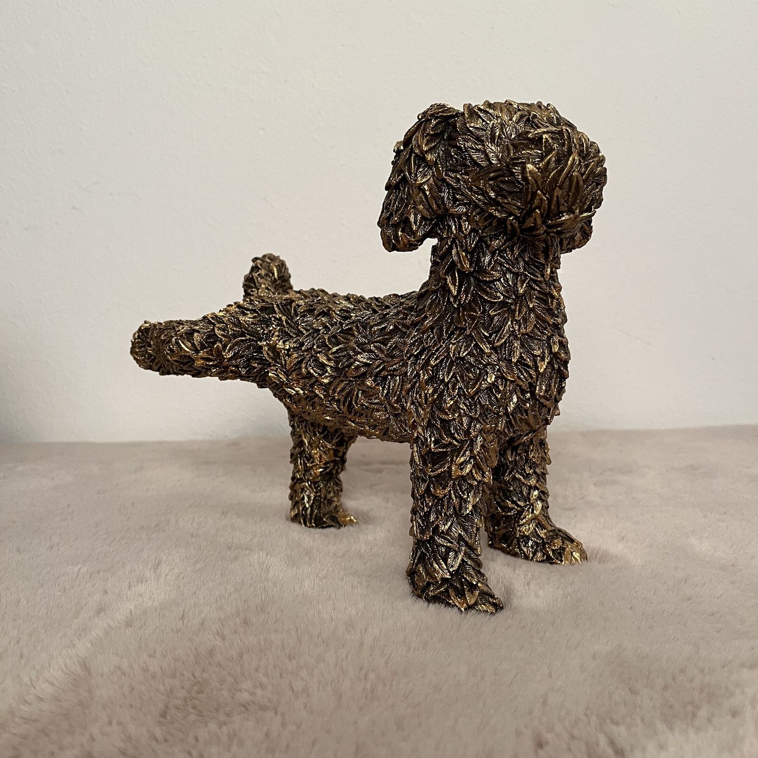 Beeld Doodle goud pootje