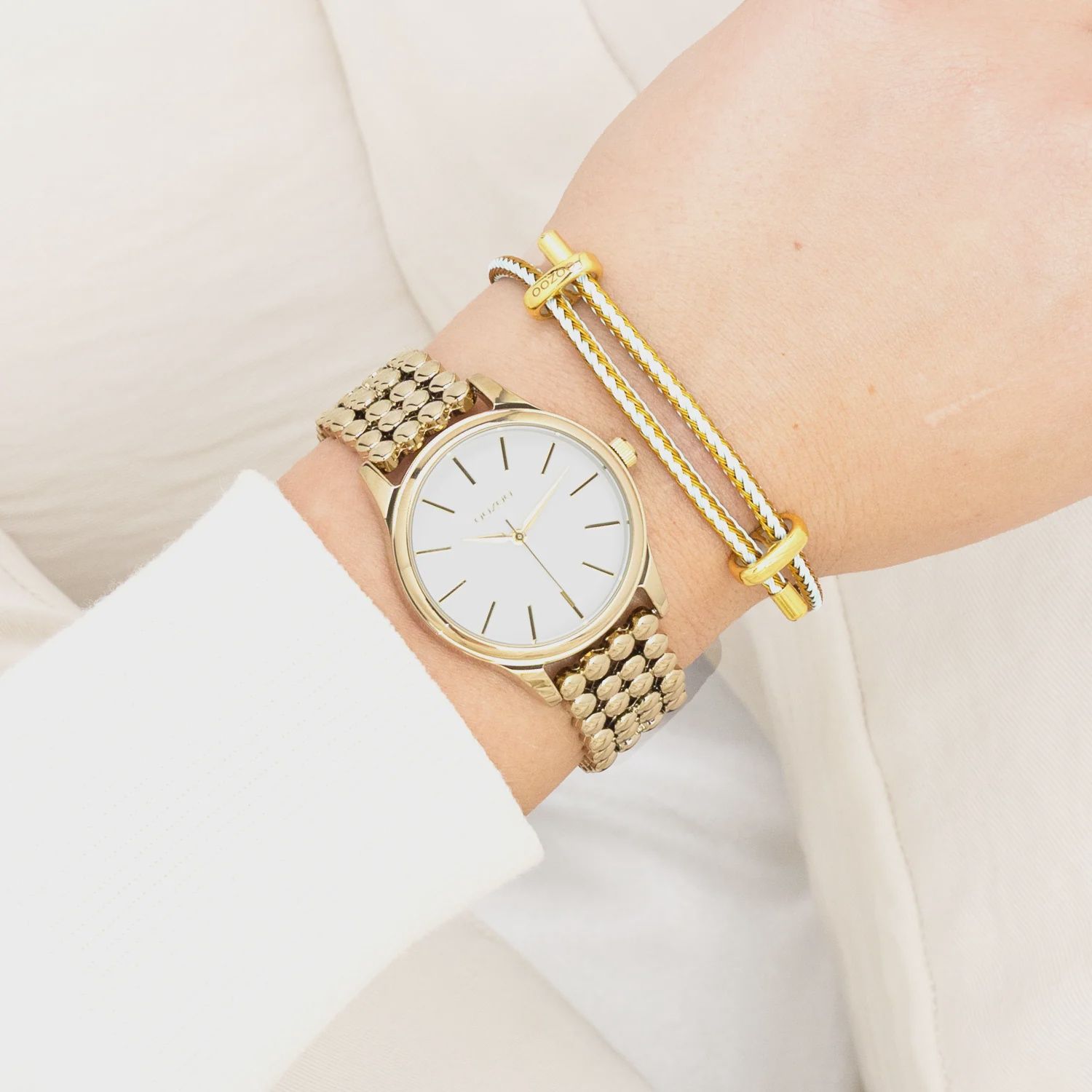 Goudkleurig horloge met dot link-armband