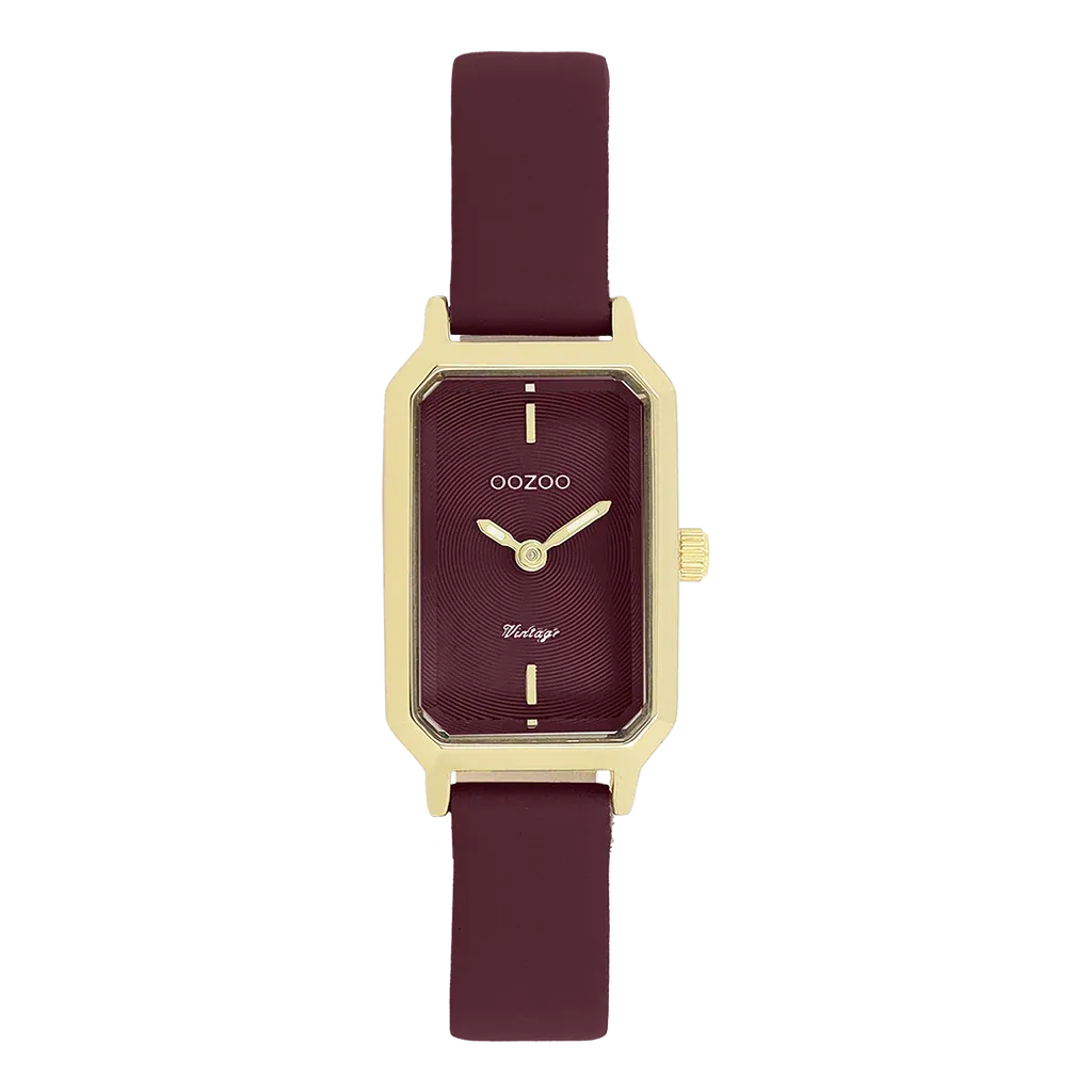 Goudkleurig horloge met bordeauxrode leren band