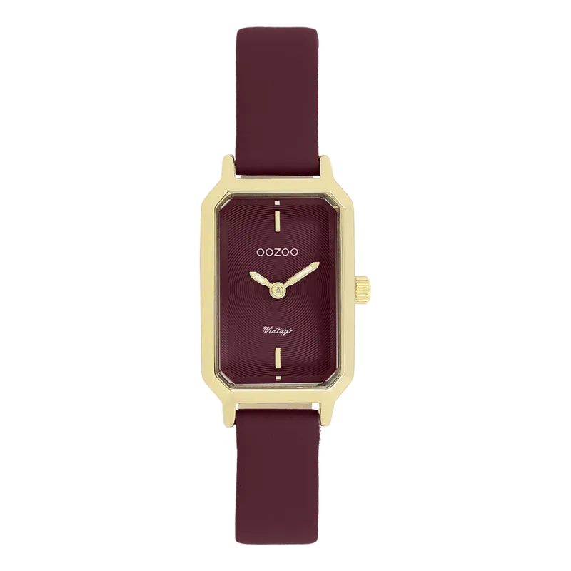 Goudkleurig horloge met bordeauxrode leren band