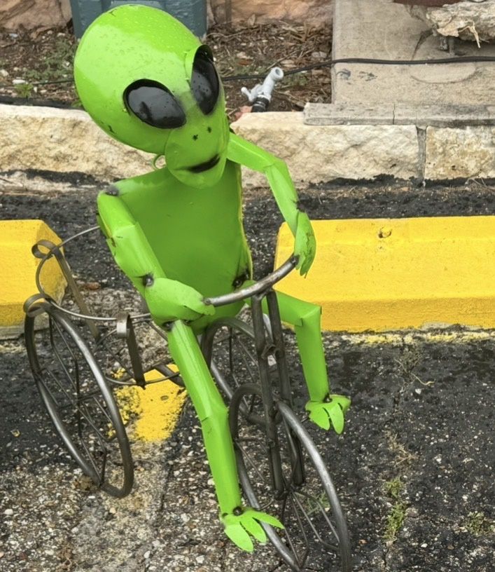 ALIEN ON TRICYCLE