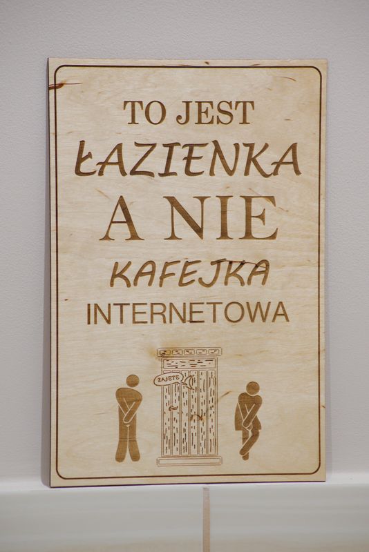 Tabliczka „To jest łazienka, a nie kafejka internetowa”