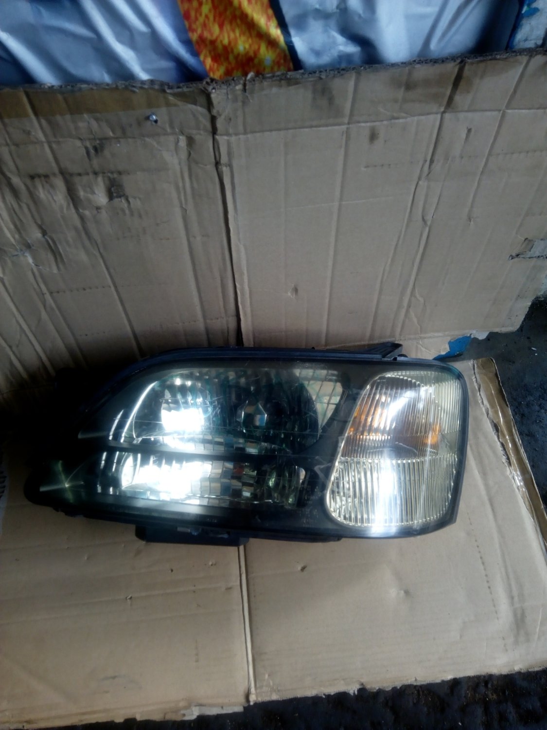 Subaru BH5 headlight