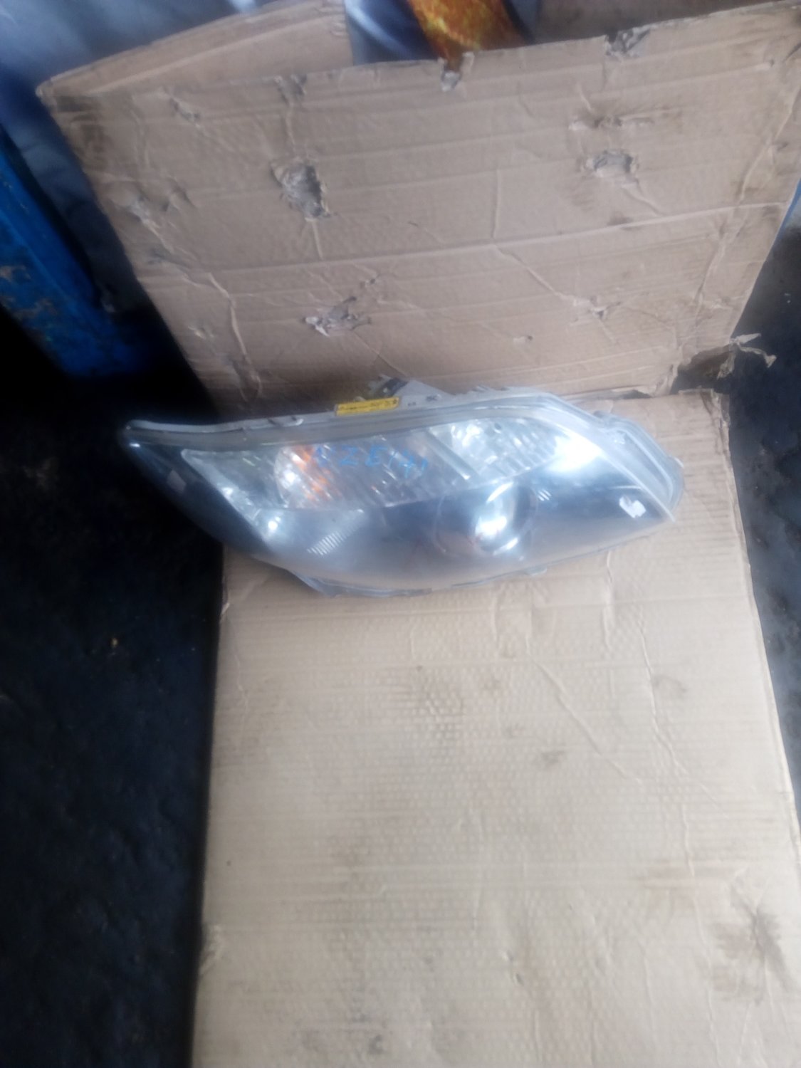 Toyota NZE headlight