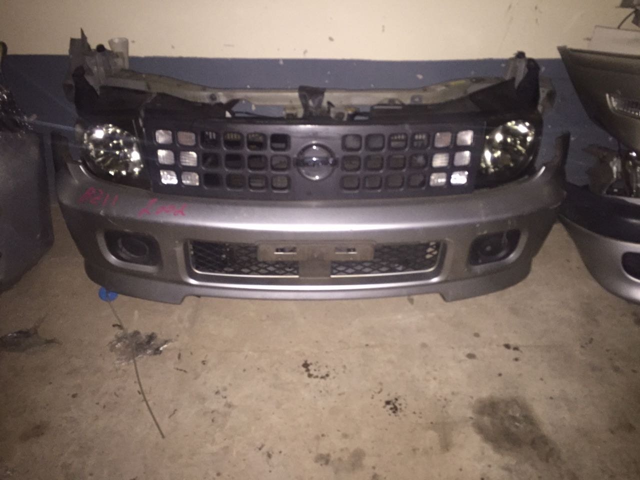 nissan cube nose cut