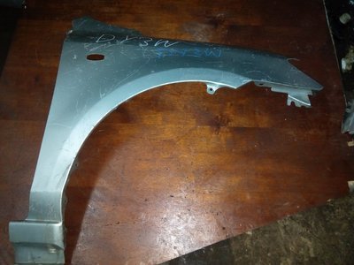 mazda demio wing