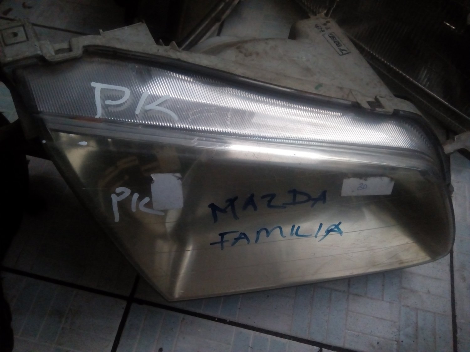 Mazda familia head light