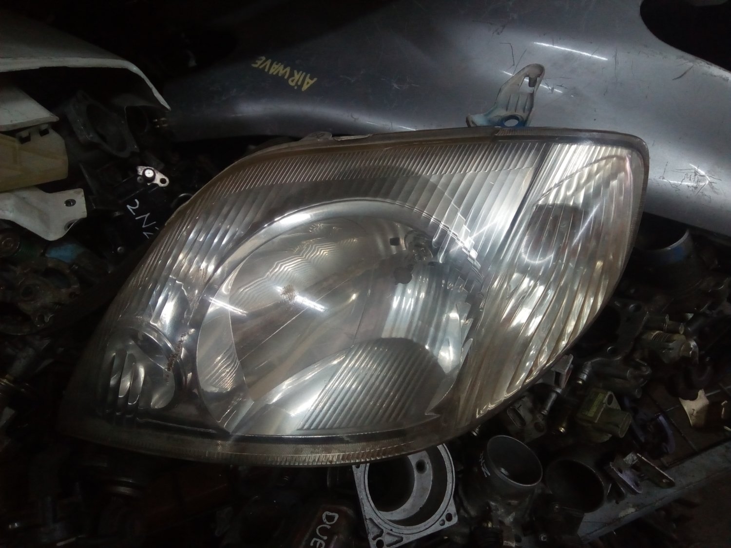 Toyota NZE head light