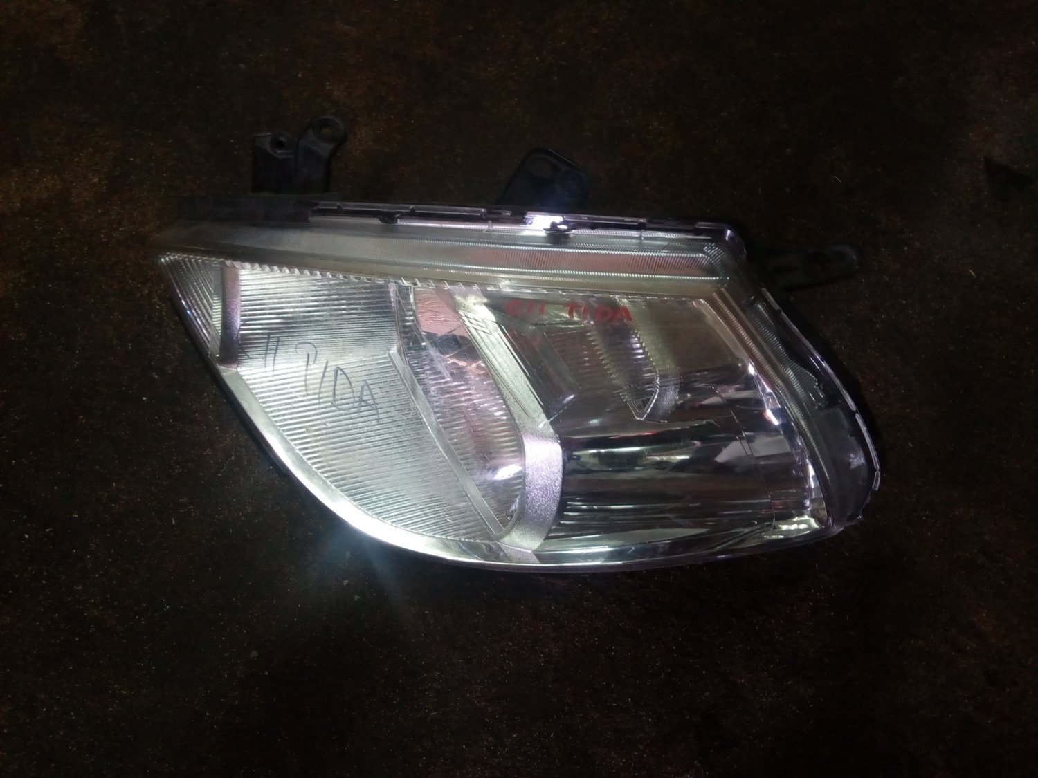 Cii Tida headlight