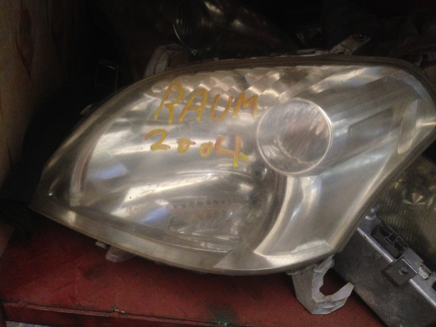 Toyota Raum head light 