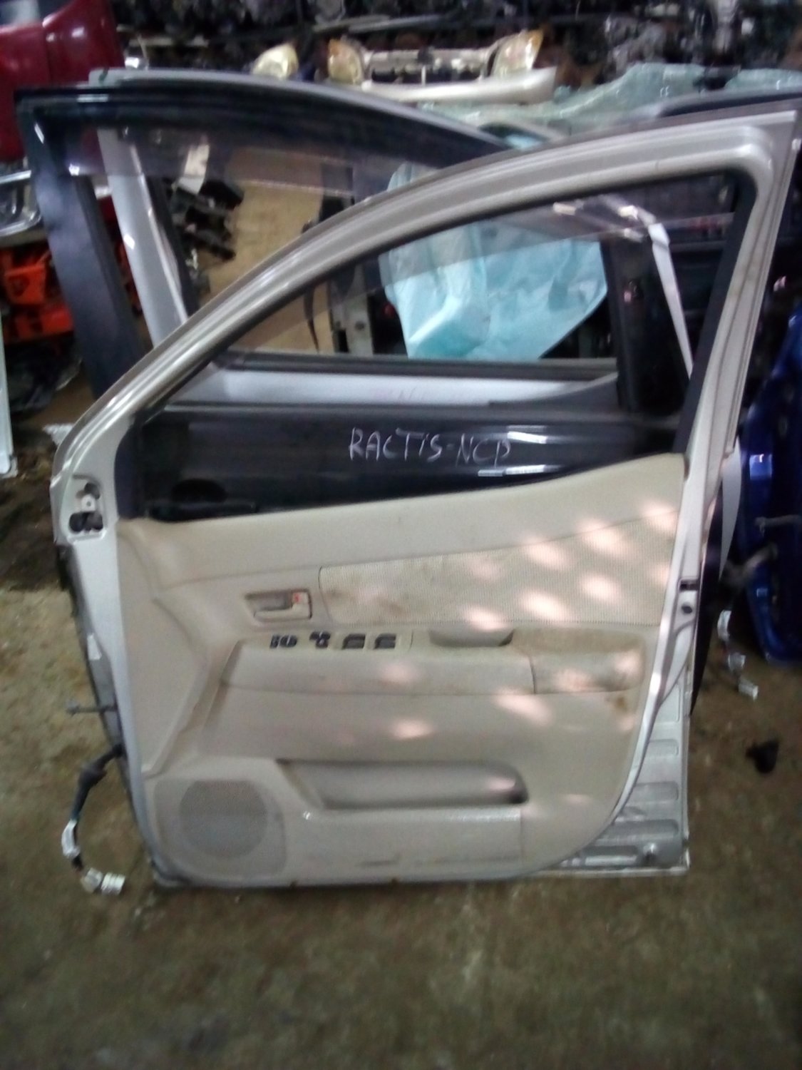 Toyota Raum drivers door