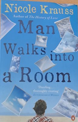 Man Walks into a Room