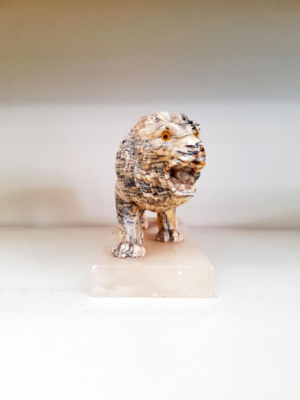 Статуетка лъв