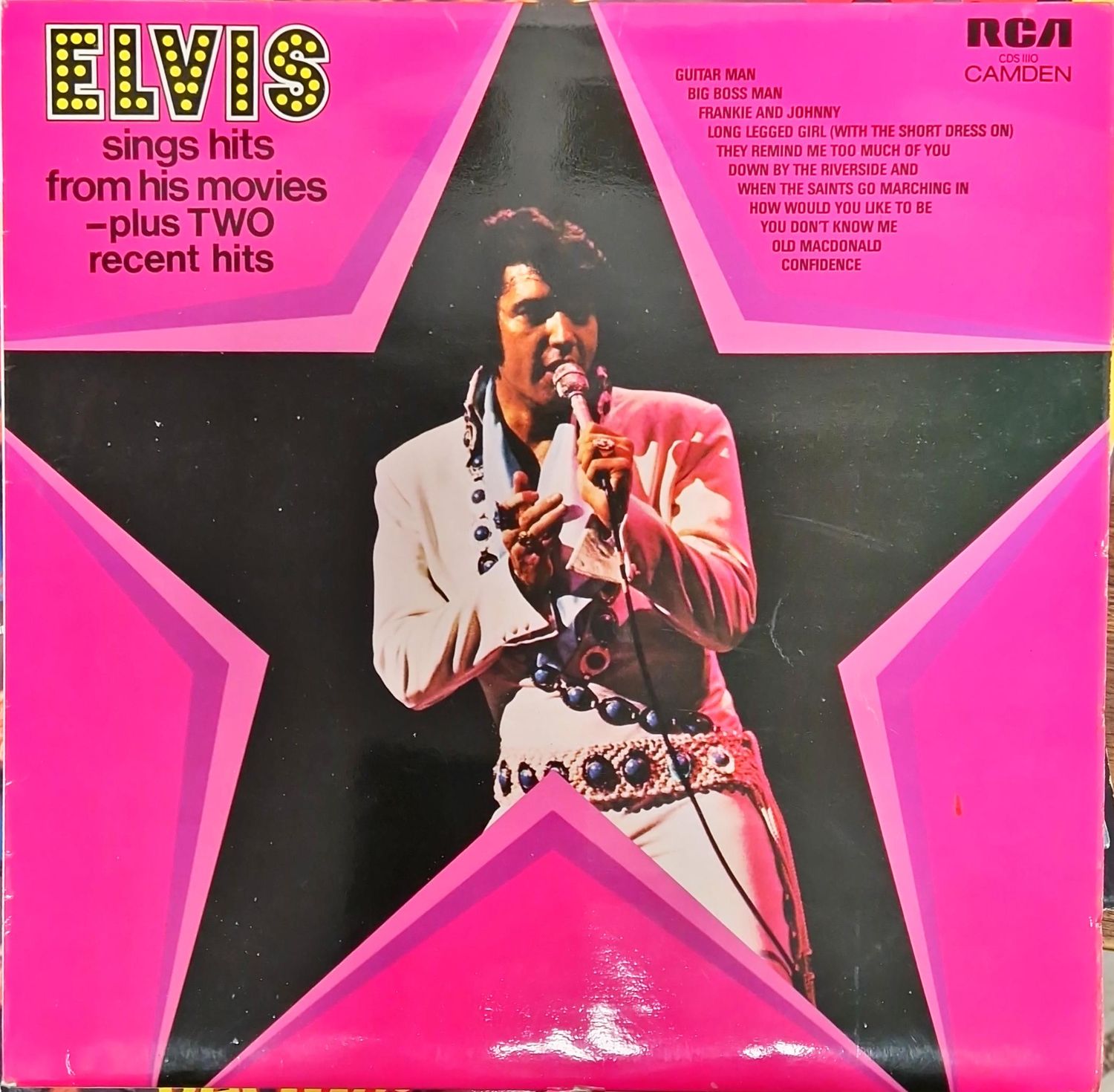 Elvis sings hits from his movies-plus two recent hits