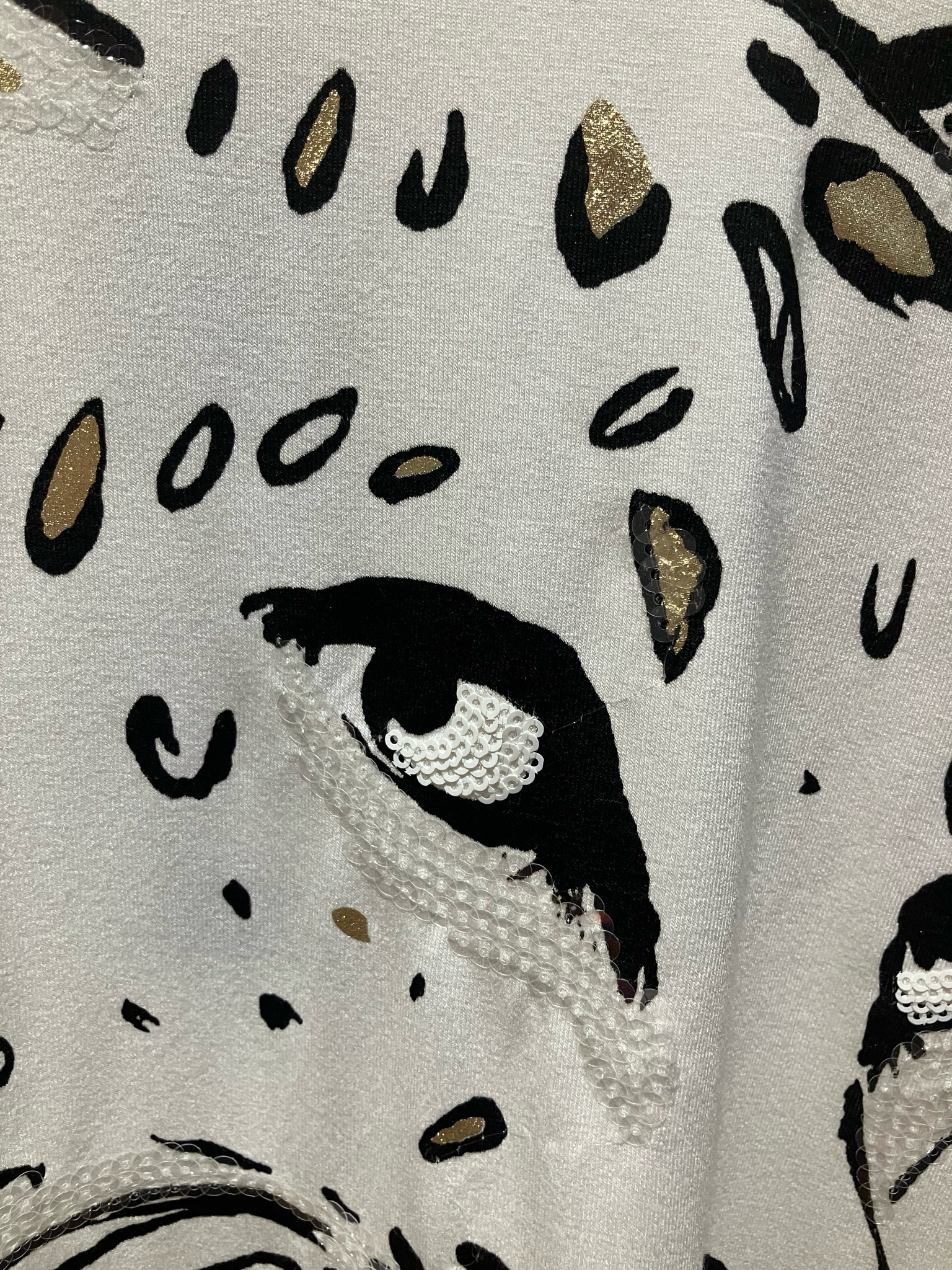 Orly Cotton Long Sleeve T-shirt With a Leopard Face Design And Lightly Embellished With Gold And Light Sequin
