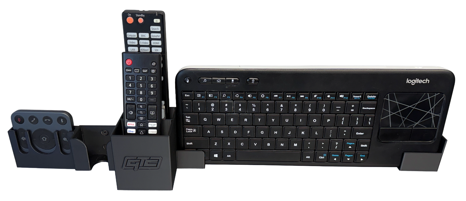 Multi-Device Wall-Mounted Keyboard & Remote Holder Multi-Device Wall-Mounted Keyboard & Remote Holder