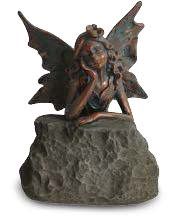 Fairy Leaning on Rock Statue