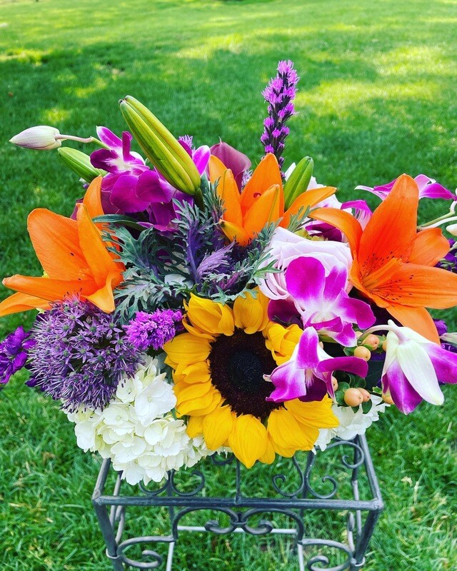 Colored Smile by Twigs Floral Studio